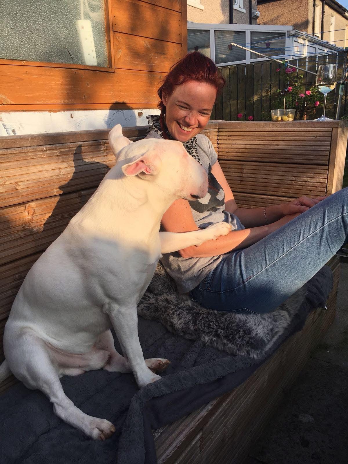 Emily with her bull terrier Kasper photographed in 2018